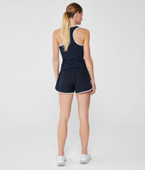 Top deportivo de tirantes anchos con espalda nadadora en color azul marino y detalles en blanco